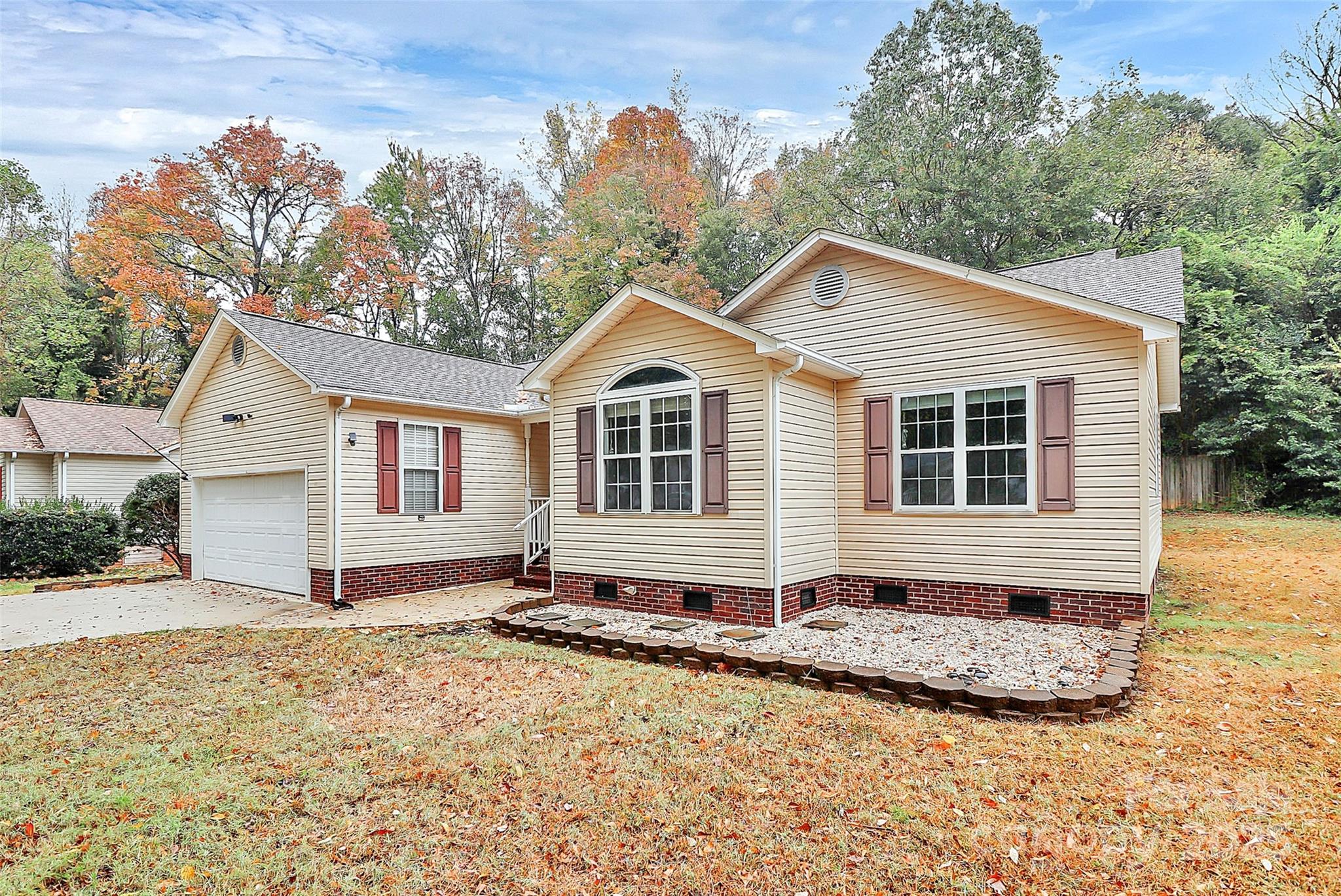 103 Wellspring Drive Fort Mill, SC 29715 - Photo 2 of 36 a front view of a house with a yard