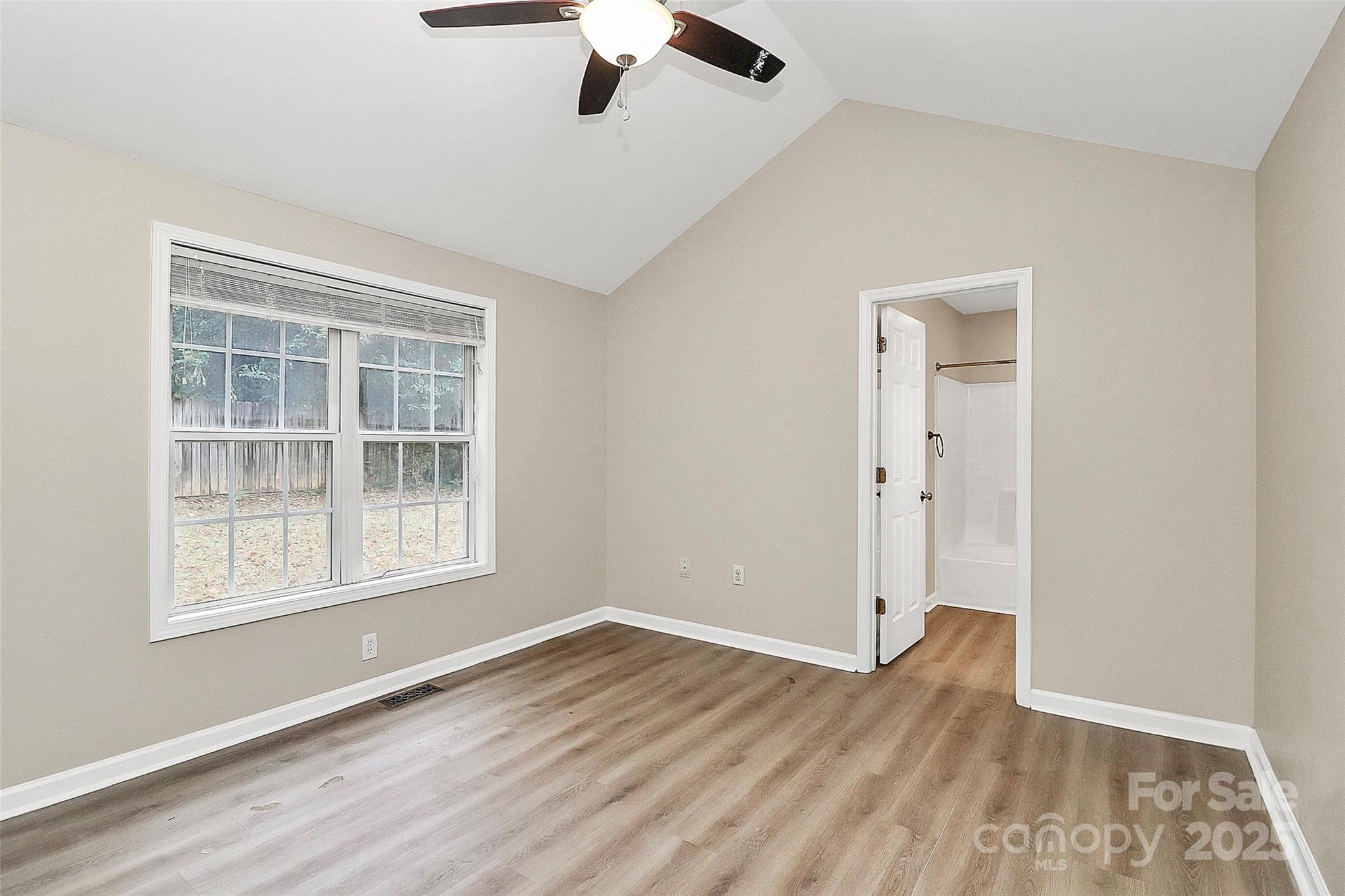 103 Wellspring Drive Fort Mill, SC 29715 - Photo 22 of 36 wooden floor in an empty room with a window