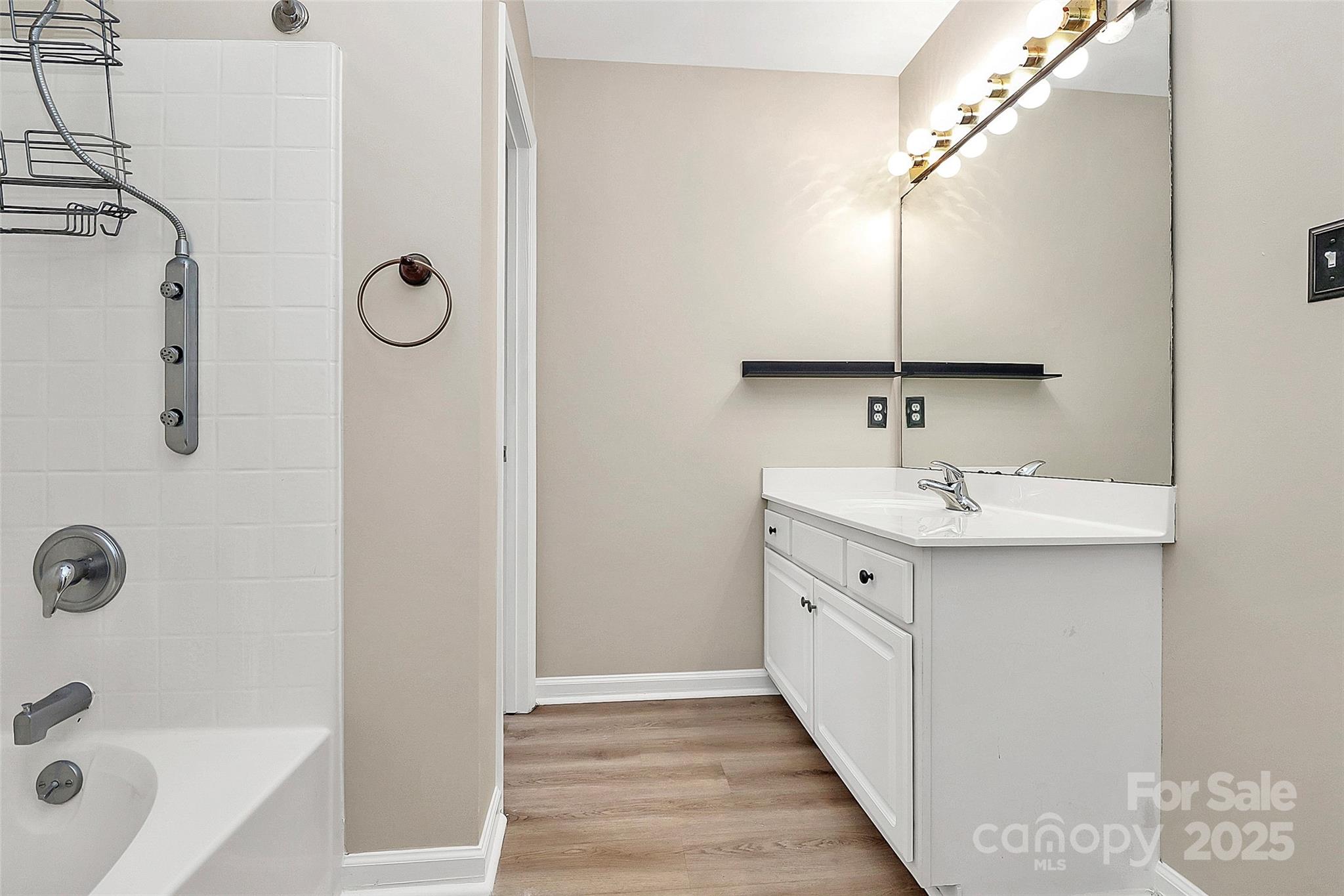 103 Wellspring Drive Fort Mill, SC 29715 - Photo 28 of 36 a bathroom with a double vanity sink a mirror and shower