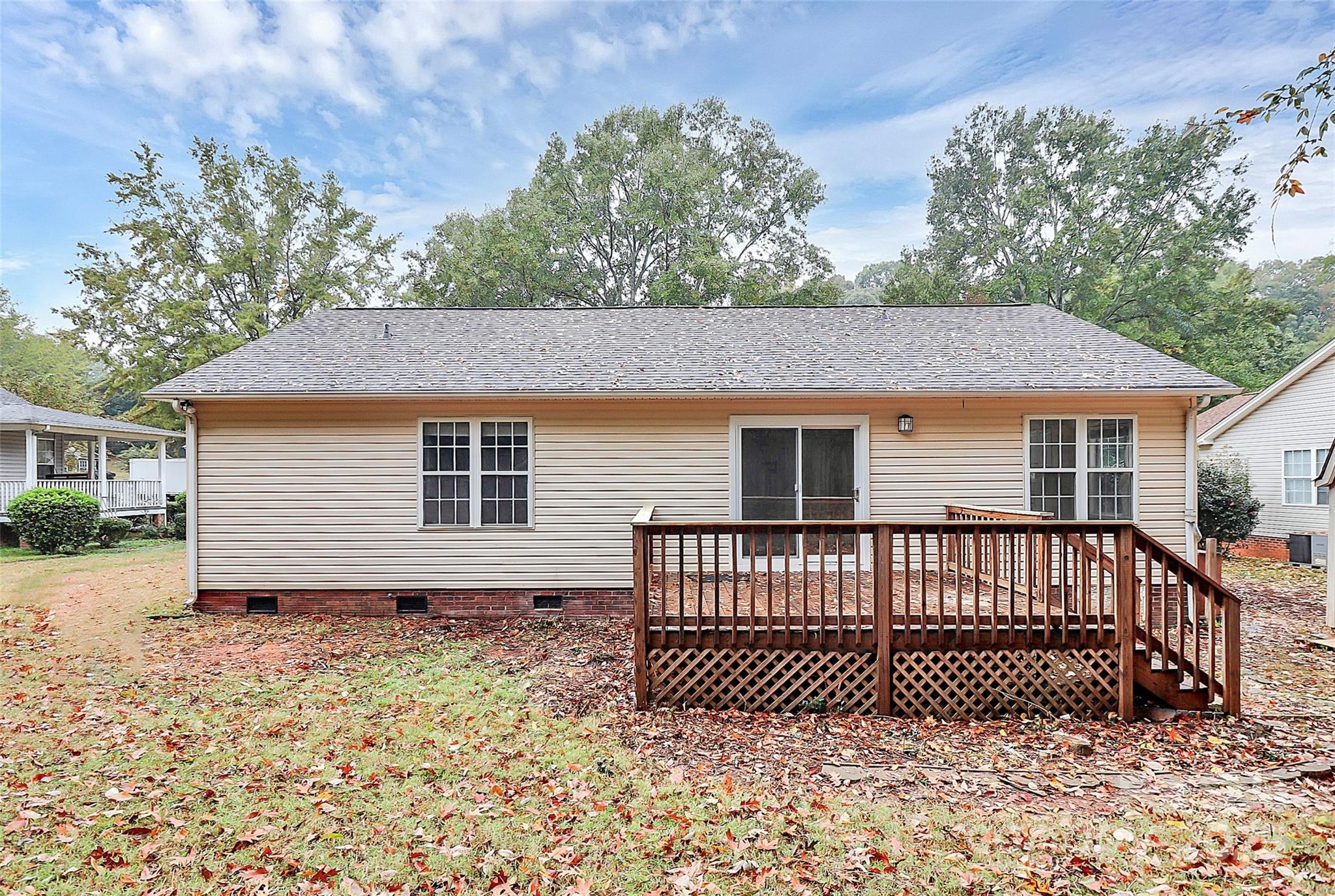 103 Wellspring Drive Fort Mill, SC 29715 - Photo 34 of 36 a view of a house with a deck and a yard