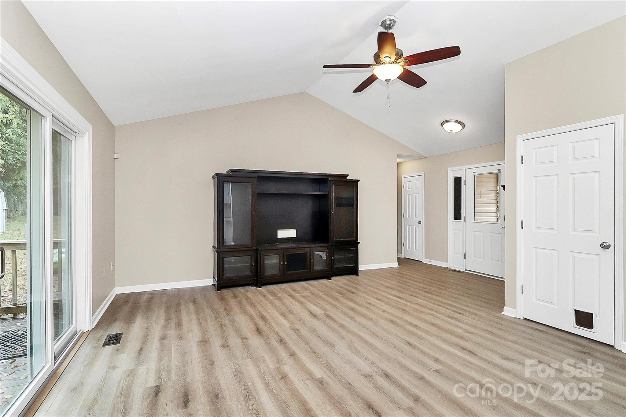 103 Wellspring Drive Fort Mill, SC 29715 - Photo 8 of 36 a view of empty room with wooden floor and fan