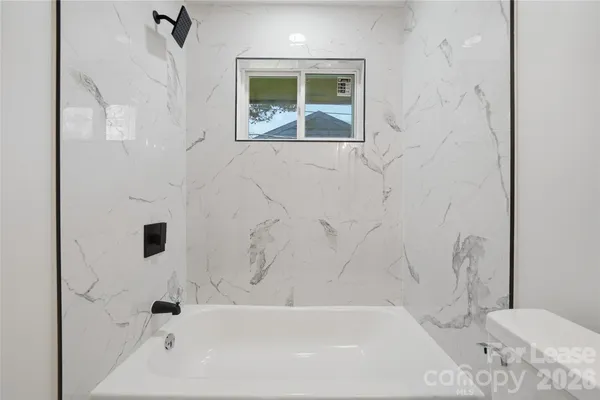 a bathroom with a bathtub