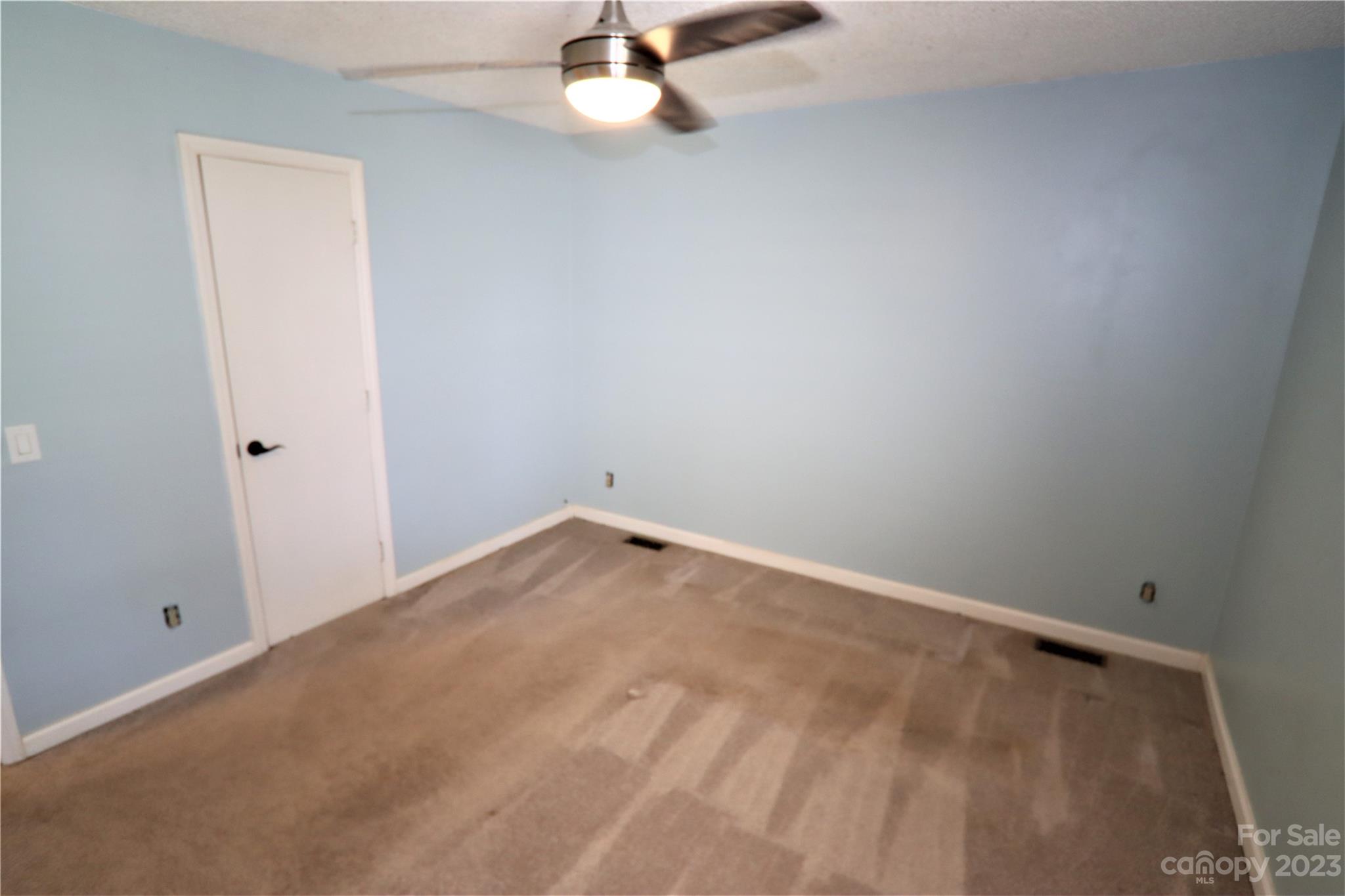 12725 Mooresville Road Mount Ulla, NC 28125 - Photo 14 of 23 an empty room with a window