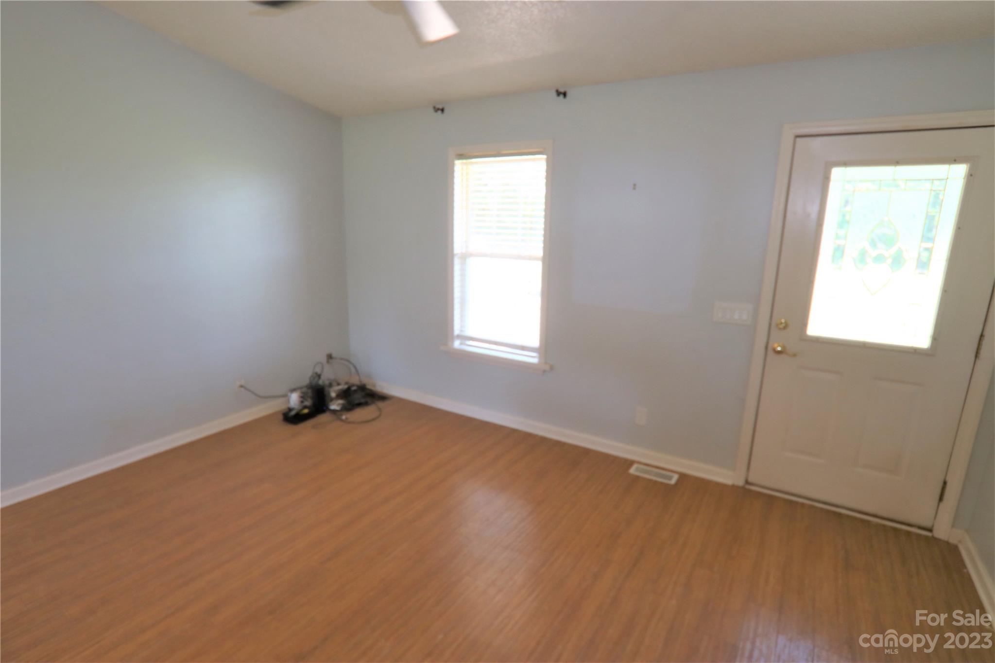 12725 Mooresville Road Mount Ulla, NC 28125 - Photo 9 of 23 an empty room with a window