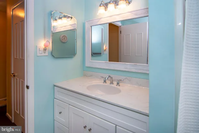 a view of a bedroom from a hallway