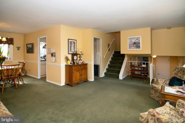 a bed room with furniture and a window