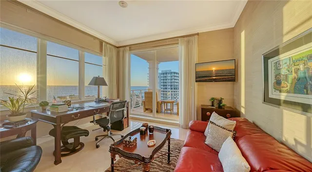 a bathroom with a granite countertop sink mirror and a shower