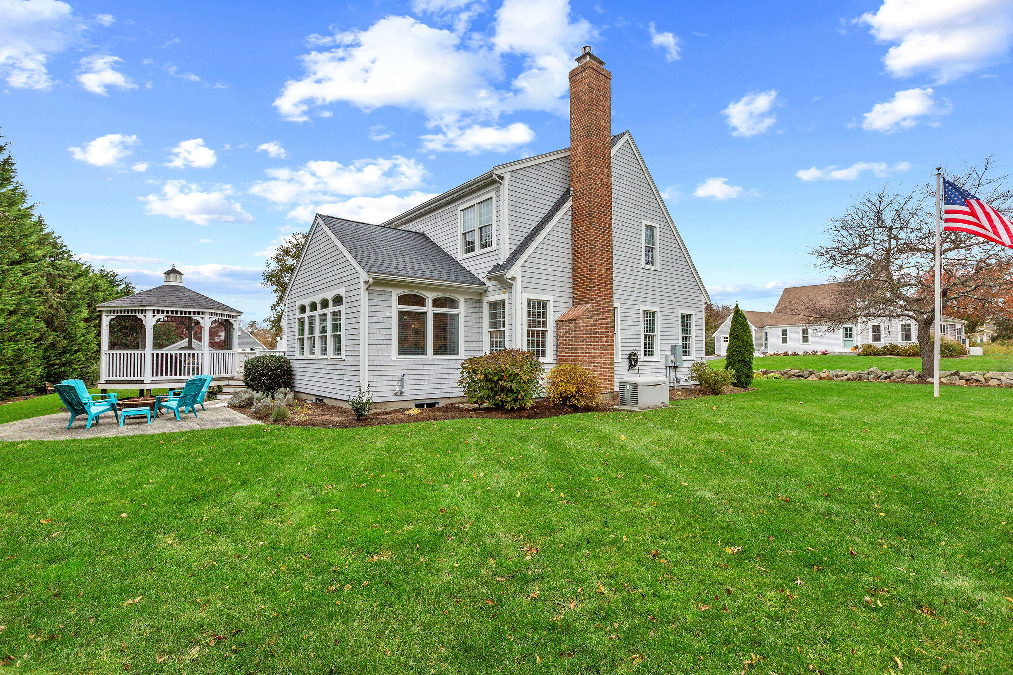 13 Hayfield Road East Dennis, MA 02641 - Photo 13 of 51 a front view of a house with a garden