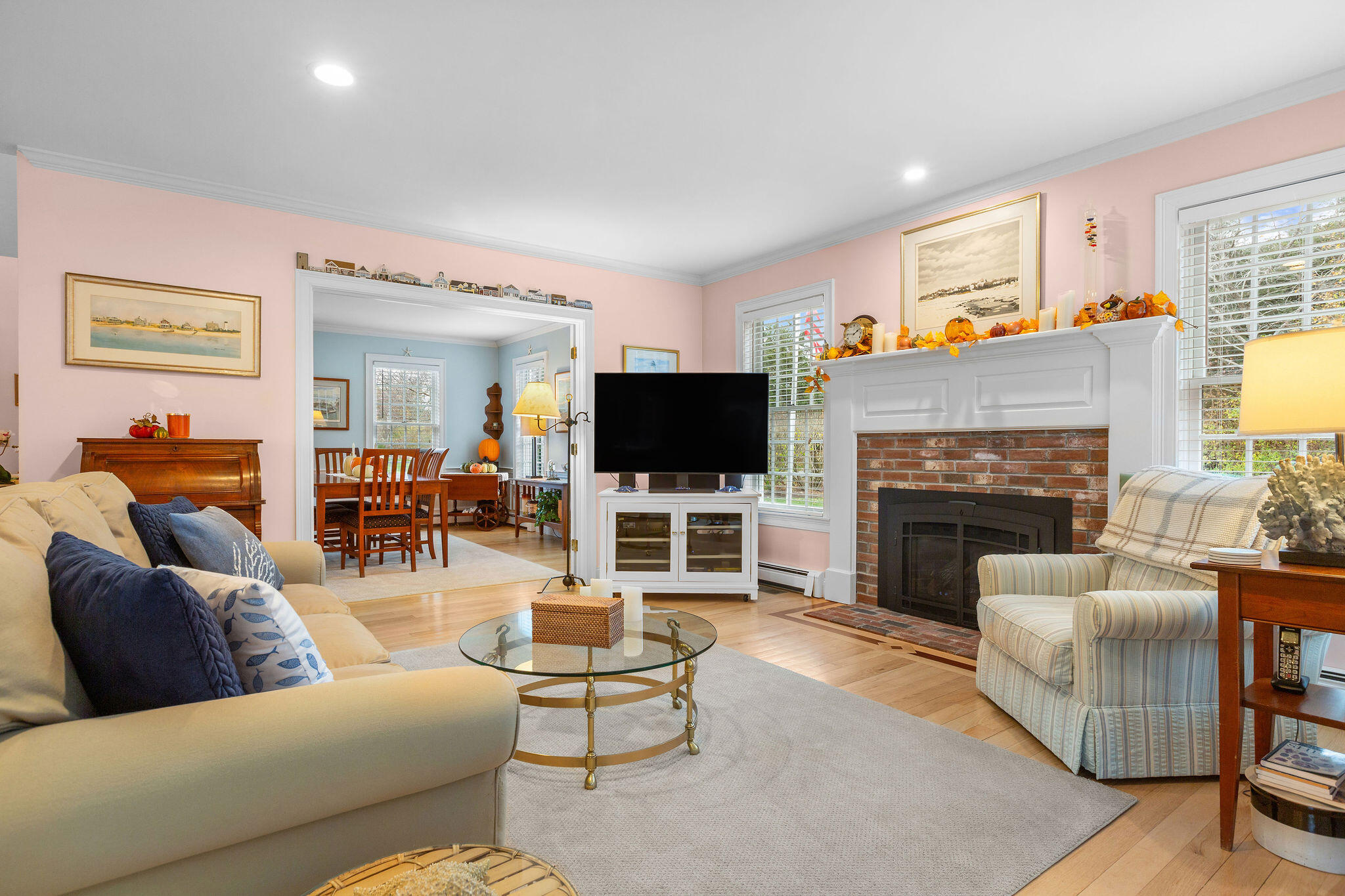 13 Hayfield Road East Dennis, MA 02641 - Photo 3 of 51 a living room with furniture a flat screen tv and a fireplace