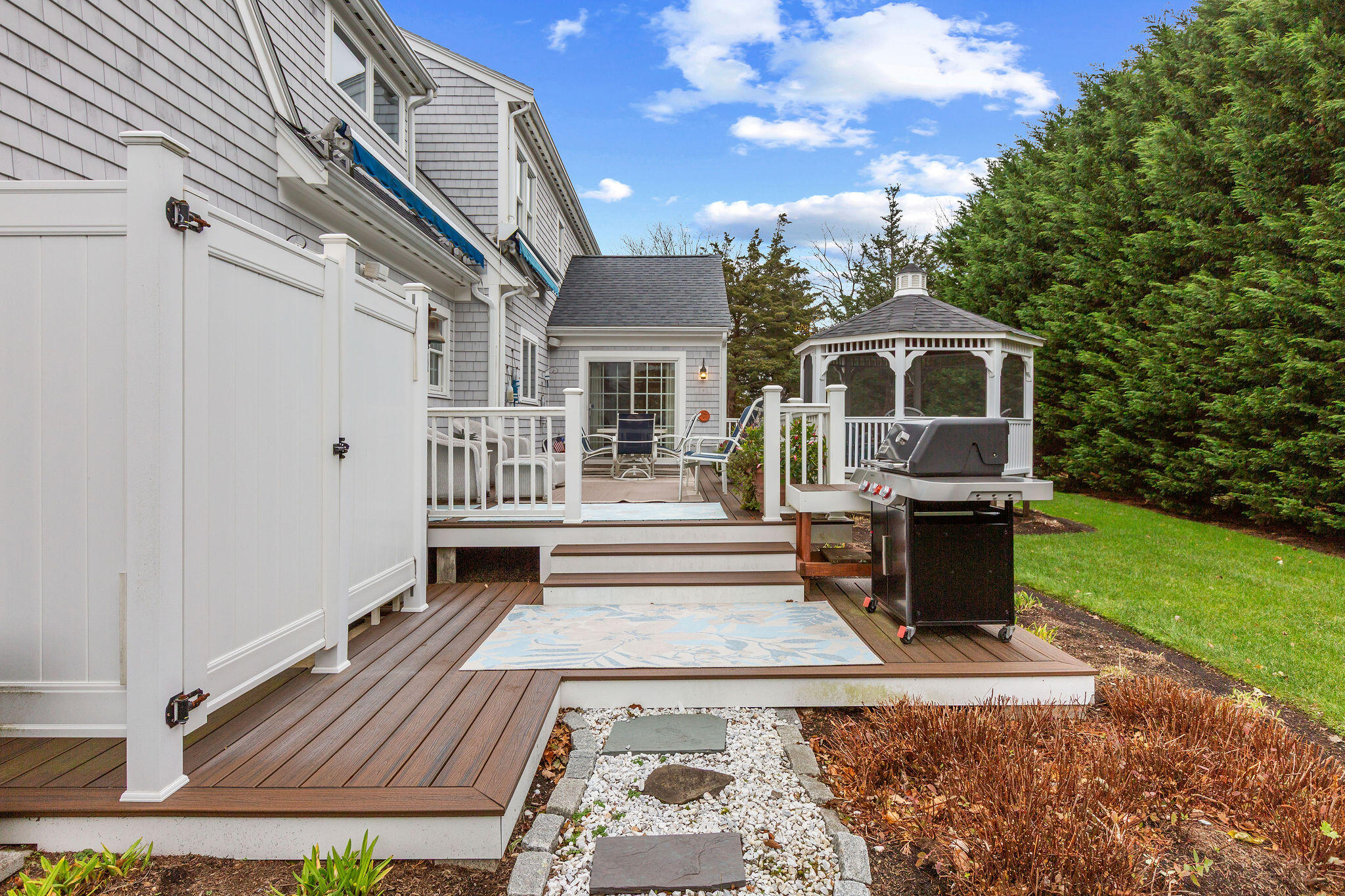 13 Hayfield Road East Dennis, MA 02641 - Photo 7 of 51 a front view of a house with a yard