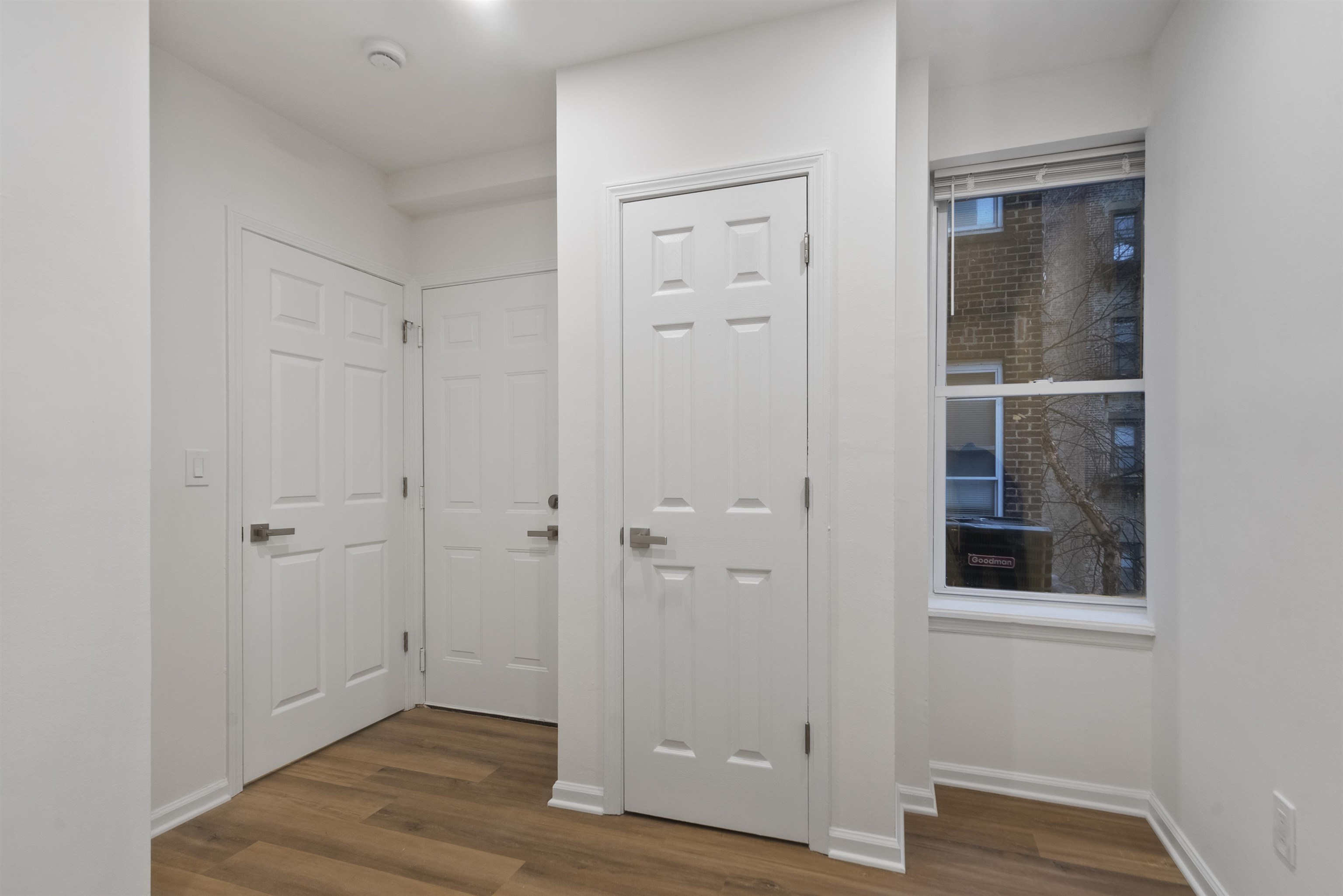 419 5th Street, Unit A Hoboken, NJ 07030 - Photo 14 of 16 a view of an empty room with wooden floor and closet