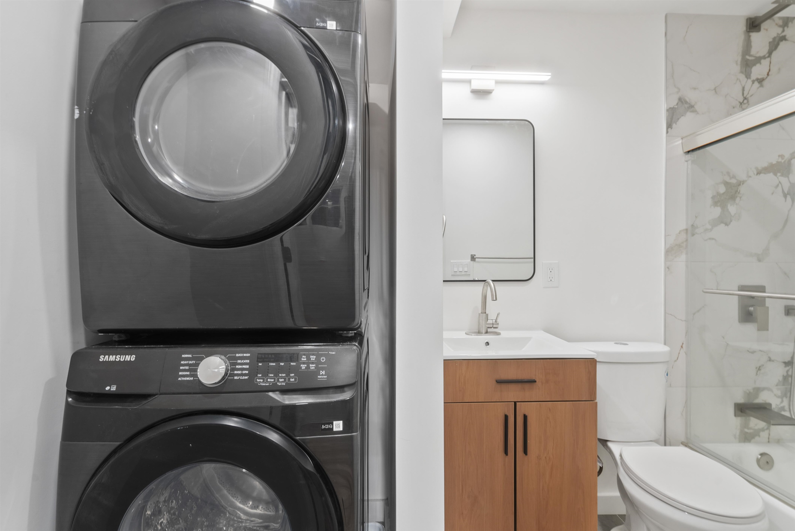 419 5th Street, Unit A Hoboken, NJ 07030 - Photo 7 of 16 a bathroom with a toilet and a sink