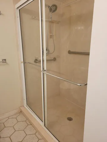 a bathroom with a sink and mirror