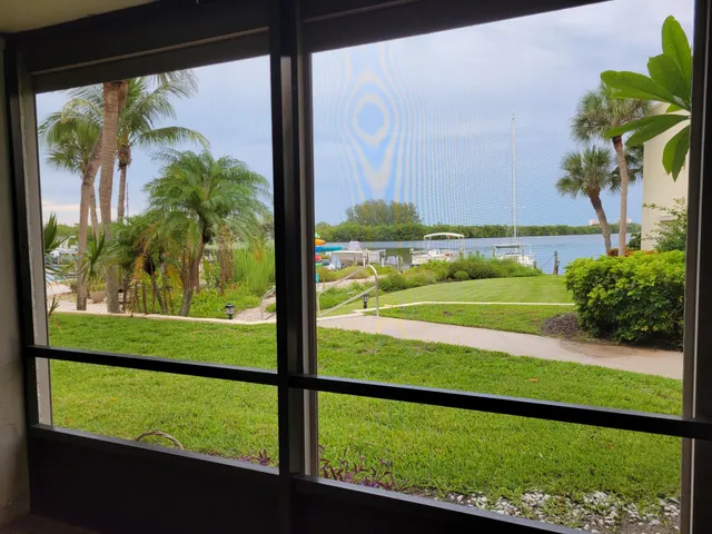 a view of a lake with a building in the background