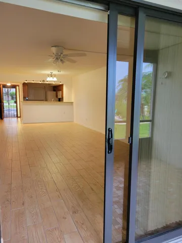 a view of a glass door of the house