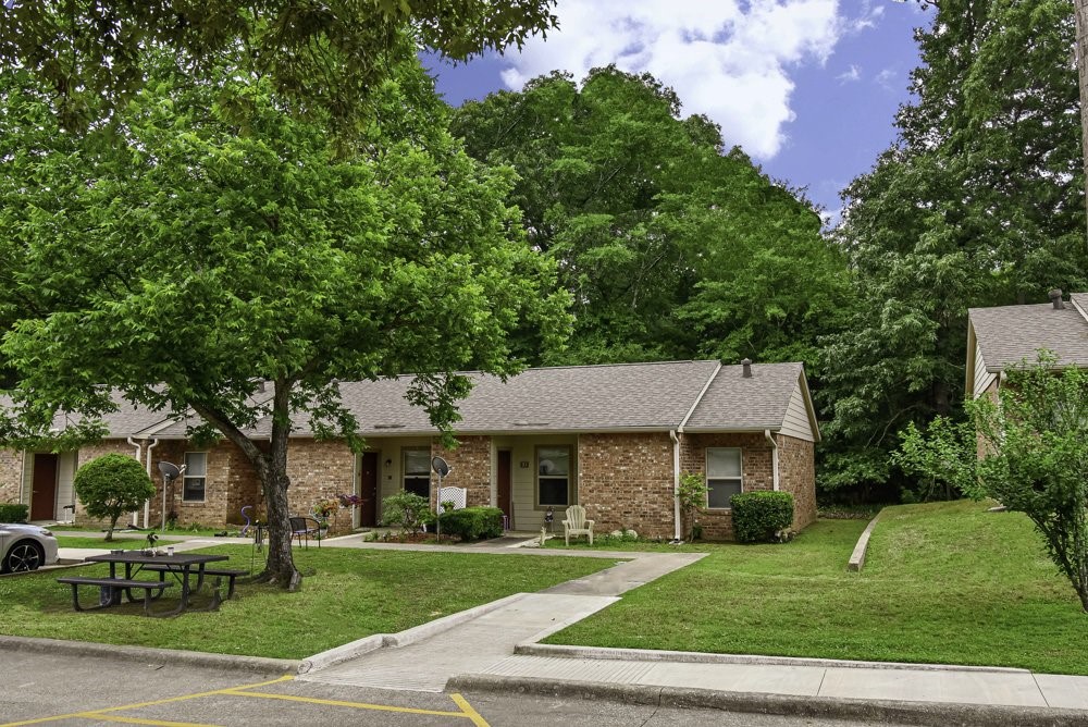 427 Martin Street Chandler, TX 75758 - Photo 4 of 11 a front view of a house with a garden