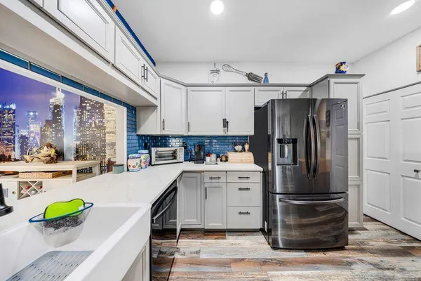 a view of a lake with a yard