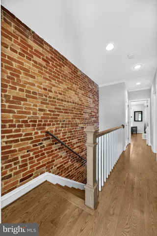 a spacious bedroom with a bed and window