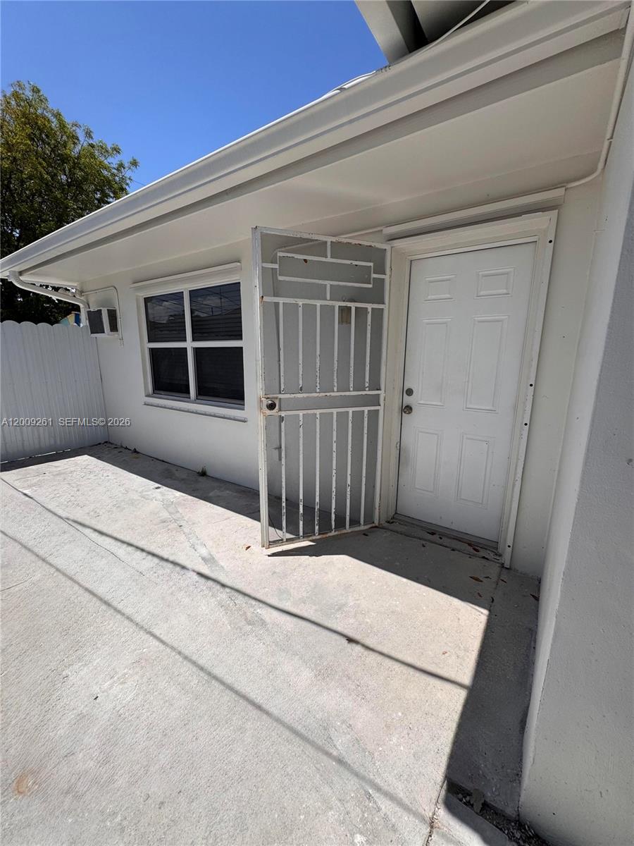 606 Southwest 58th Court, Unit 1 Miami, FL 33144 - Photo 1 of 7 a front view of a house