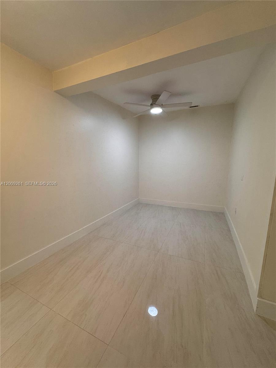 606 Southwest 58th Court, Unit 1 Miami, FL 33144 - Photo 3 of 7 a view of an empty room