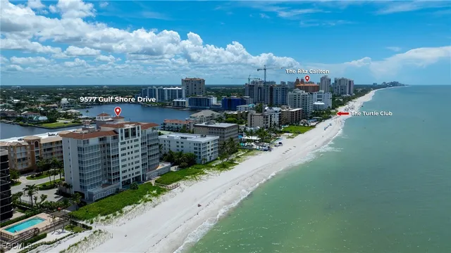 a view of a city with lawn chairs
