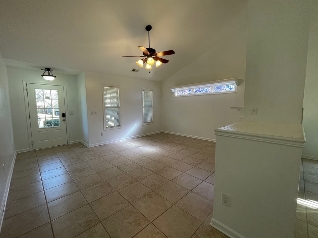 413 Arrowhead Trail Canton, GA 30114 - Photo 11 of 54 Family room and lighted front door