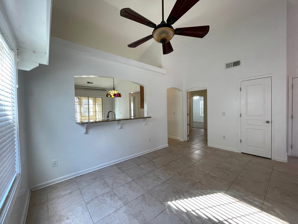 413 Arrowhead Trail Canton, GA 30114 - Photo 12 of 54 Formal Dining with high ceiling and breakfast bar