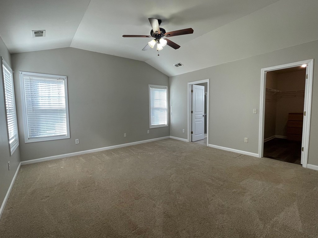 413 Arrowhead Trail Canton, GA 30114 - Photo 25 of 54 Primary Bedroom is vaulted with Large Walk In clos