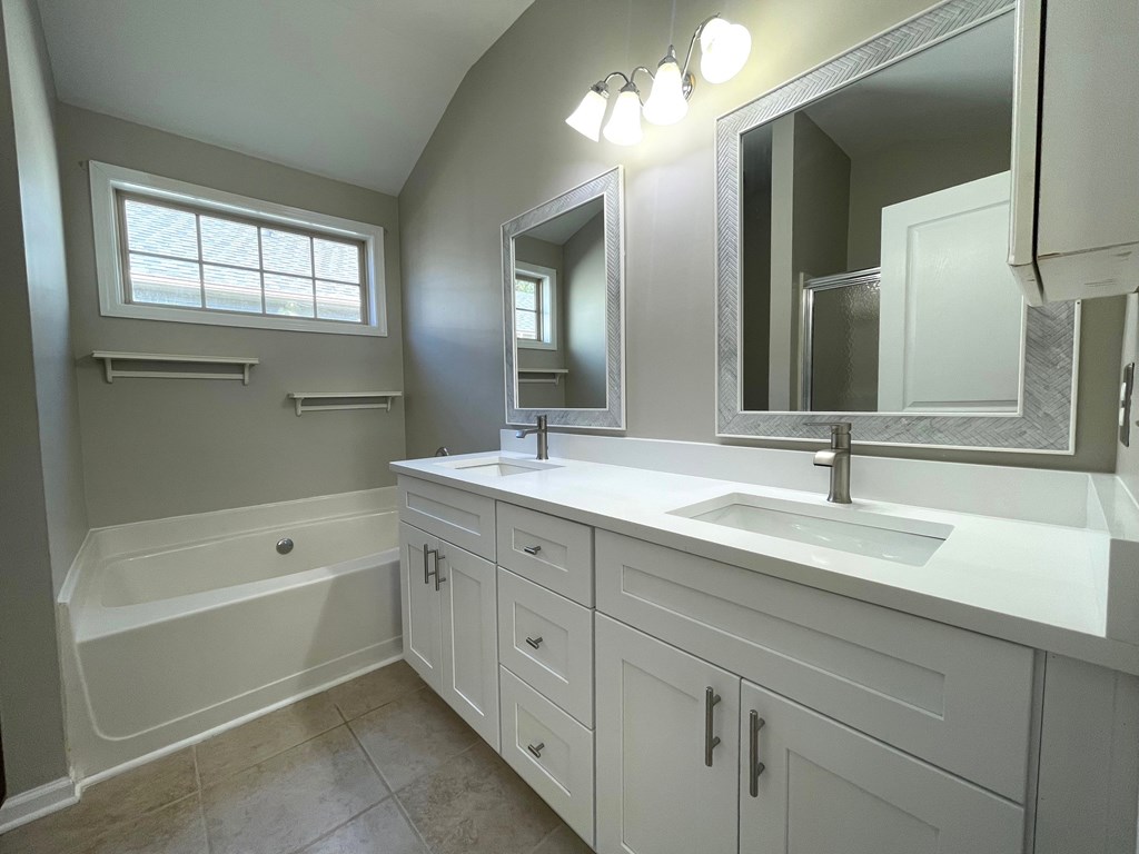 413 Arrowhead Trail Canton, GA 30114 - Photo 28 of 54 Primary Bathroom - Sep. garden tub and walk in sho