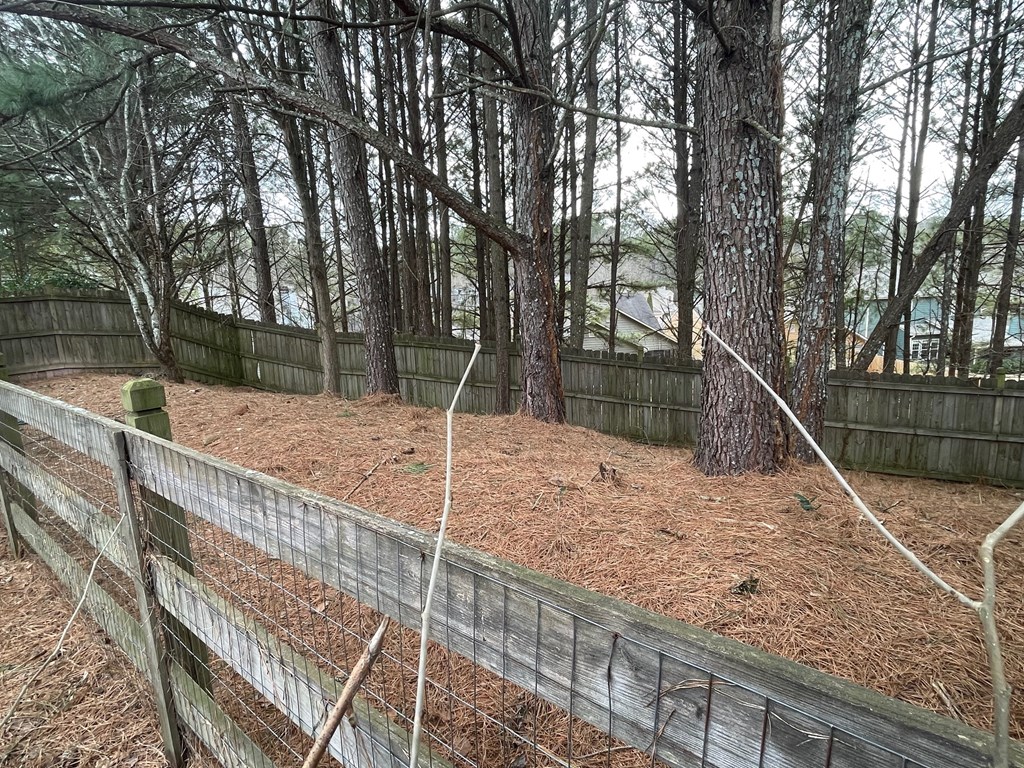 413 Arrowhead Trail Canton, GA 30114 - Photo 44 of 54 Double fenced back yard - great space for dog spac