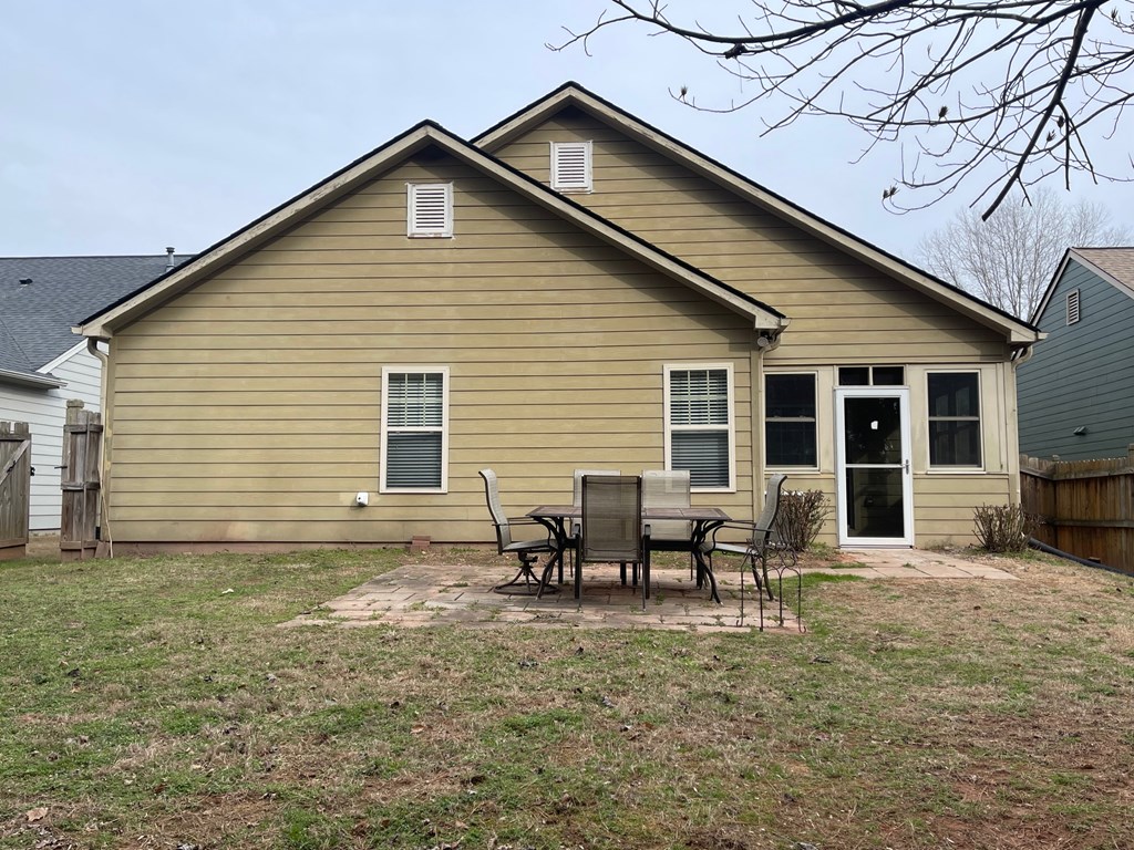 413 Arrowhead Trail Canton, GA 30114 - Photo 48 of 54 Back of the house - patio - sunroom space