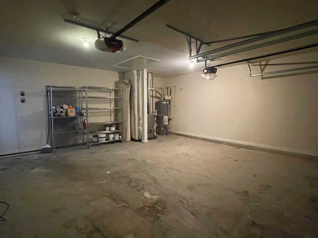 413 Arrowhead Trail Canton, GA 30114 - Photo 49 of 54 garage and room for storage - newer water heater