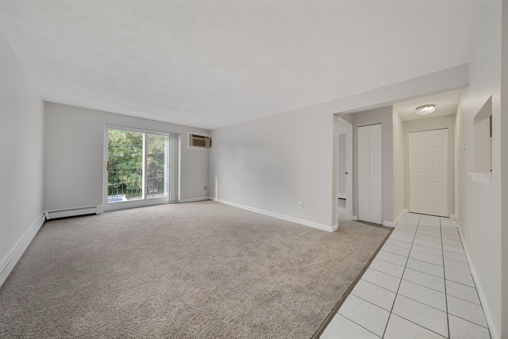 55 Eleanor Street, Unit 17 Chelsea, MA 02150 - Photo 8 of 21 a view of an empty room with a window