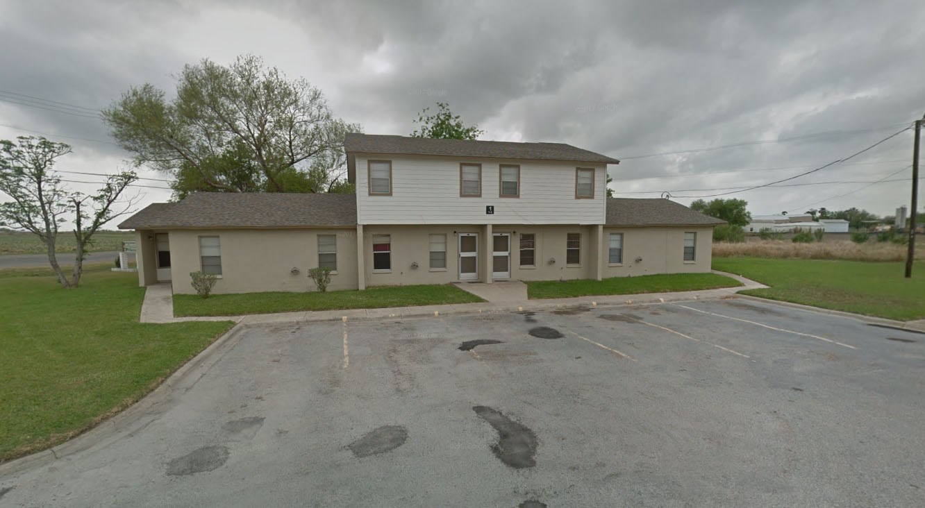 1100 East Santa Rosa Avenue Edcouch, TX 78538 - Photo 3 of 6 a front view of a house with a yard and garage