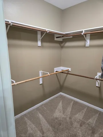 a view of a room with racks on the wall