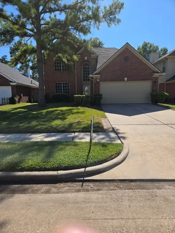 a house view with a garden space