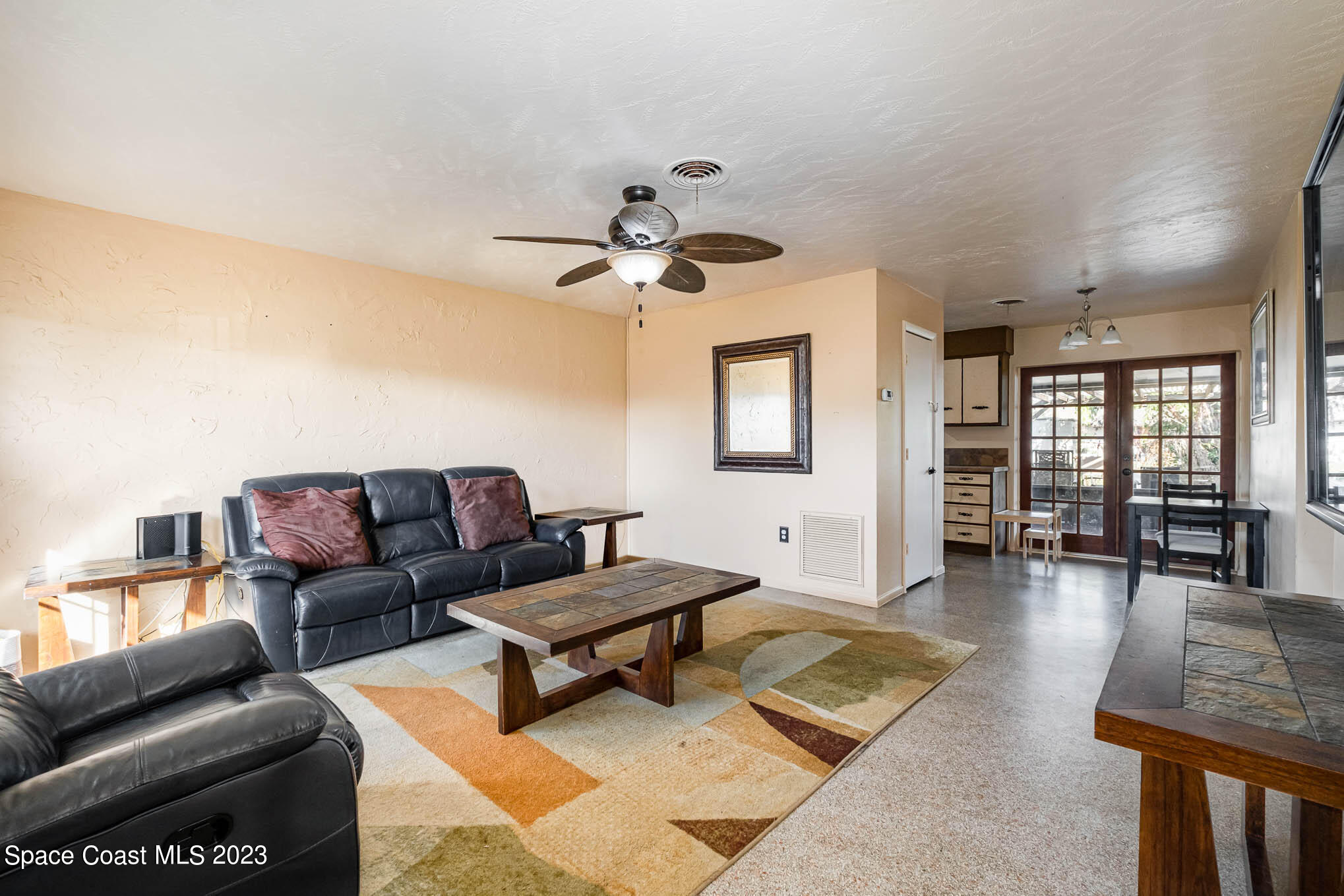 2710 Locksley Road Melbourne, FL 32935 - Photo 5 of 25 a living room with furniture