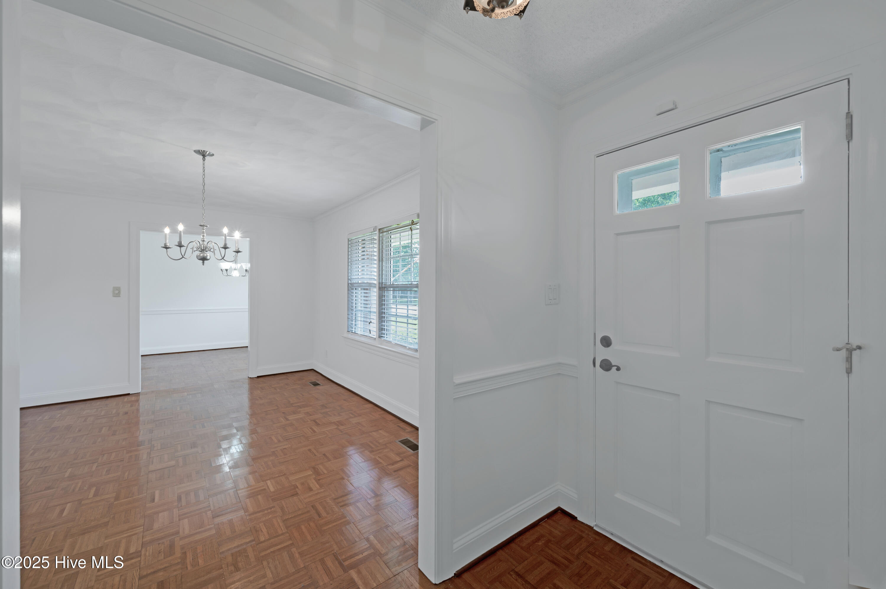 311 Prince Road Greenville, NC 27858 - Photo 11 of 52 Inside view from front door showing foyer, living room & formal dining room