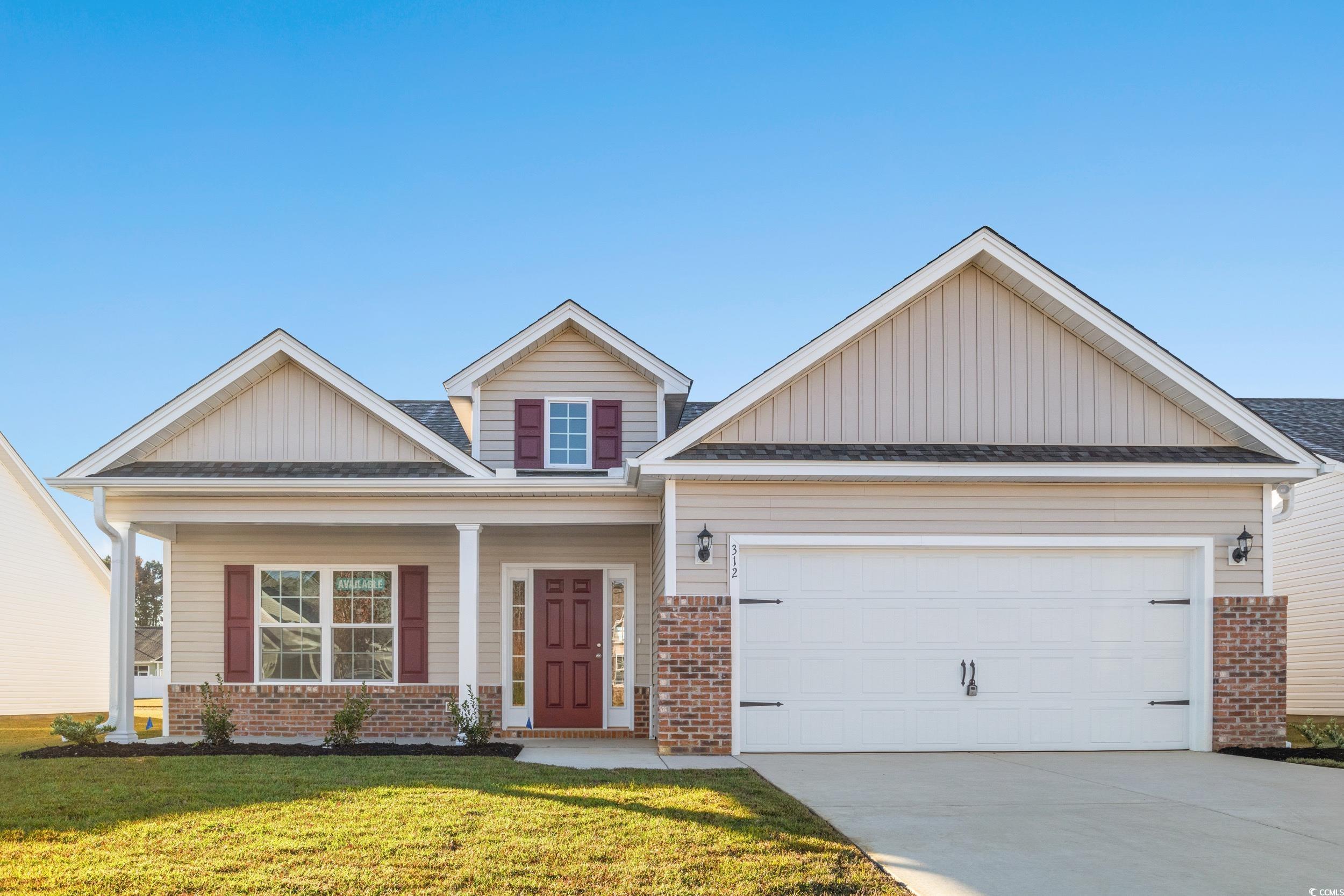 312 Lakota Loop Longs, SC 29568 - Photo 1 of 17 Craftsman house featuring a garage and a front law