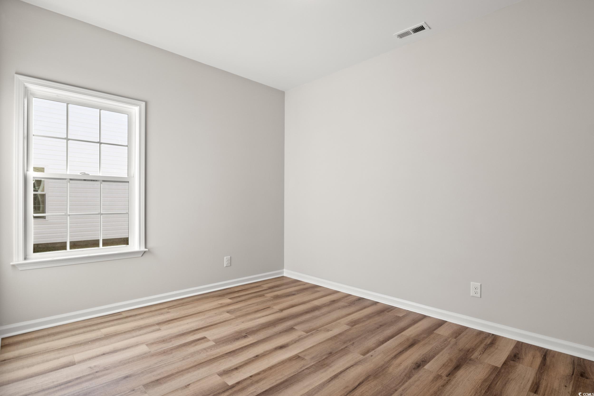 312 Lakota Loop Longs, SC 29568 - Photo 11 of 17 Unfurnished room with light wood-type flooring