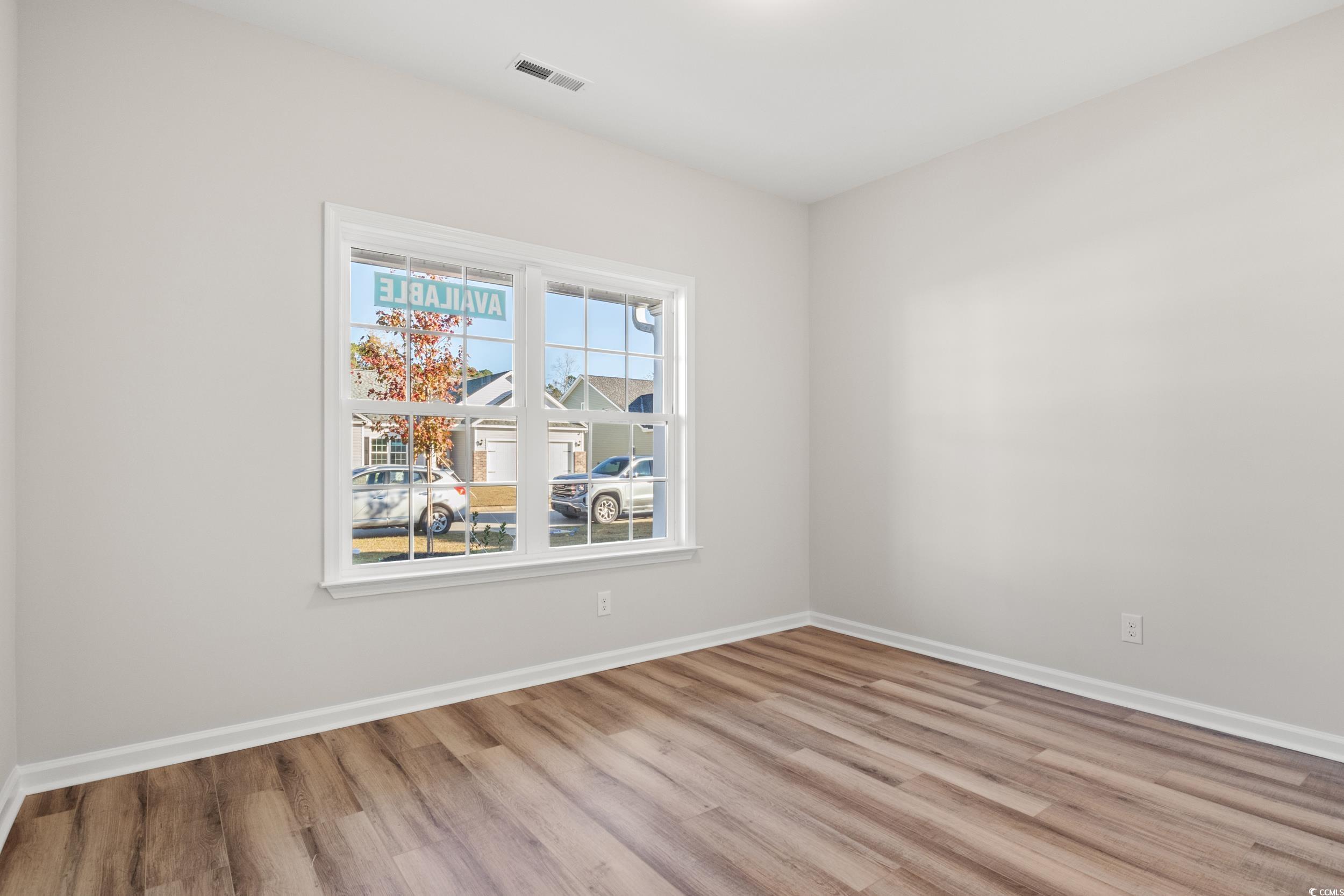 312 Lakota Loop Longs, SC 29568 - Photo 12 of 17 Unfurnished room featuring light hardwood / wood-s
