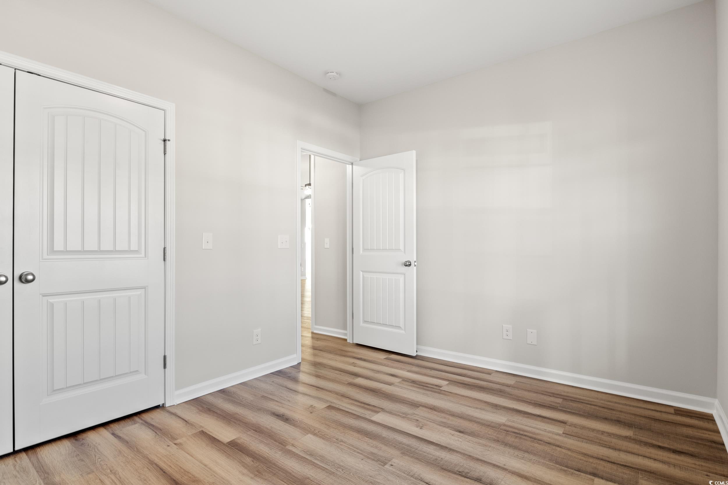 312 Lakota Loop Longs, SC 29568 - Photo 13 of 17 Unfurnished bedroom with light hardwood / wood-sty