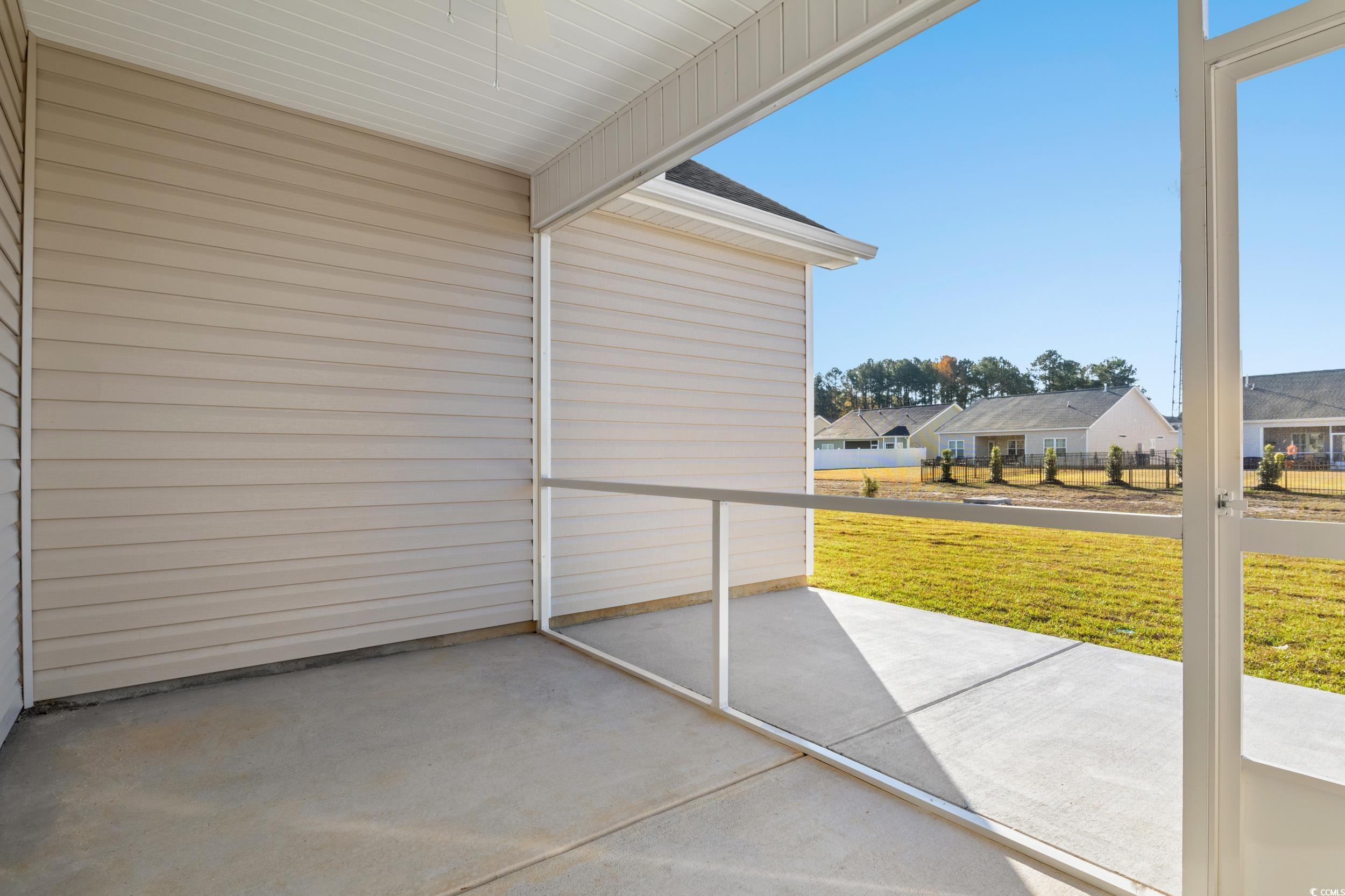 312 Lakota Loop Longs, SC 29568 - Photo 16 of 17 Unfurnished sunroom featuring a wealth of natural