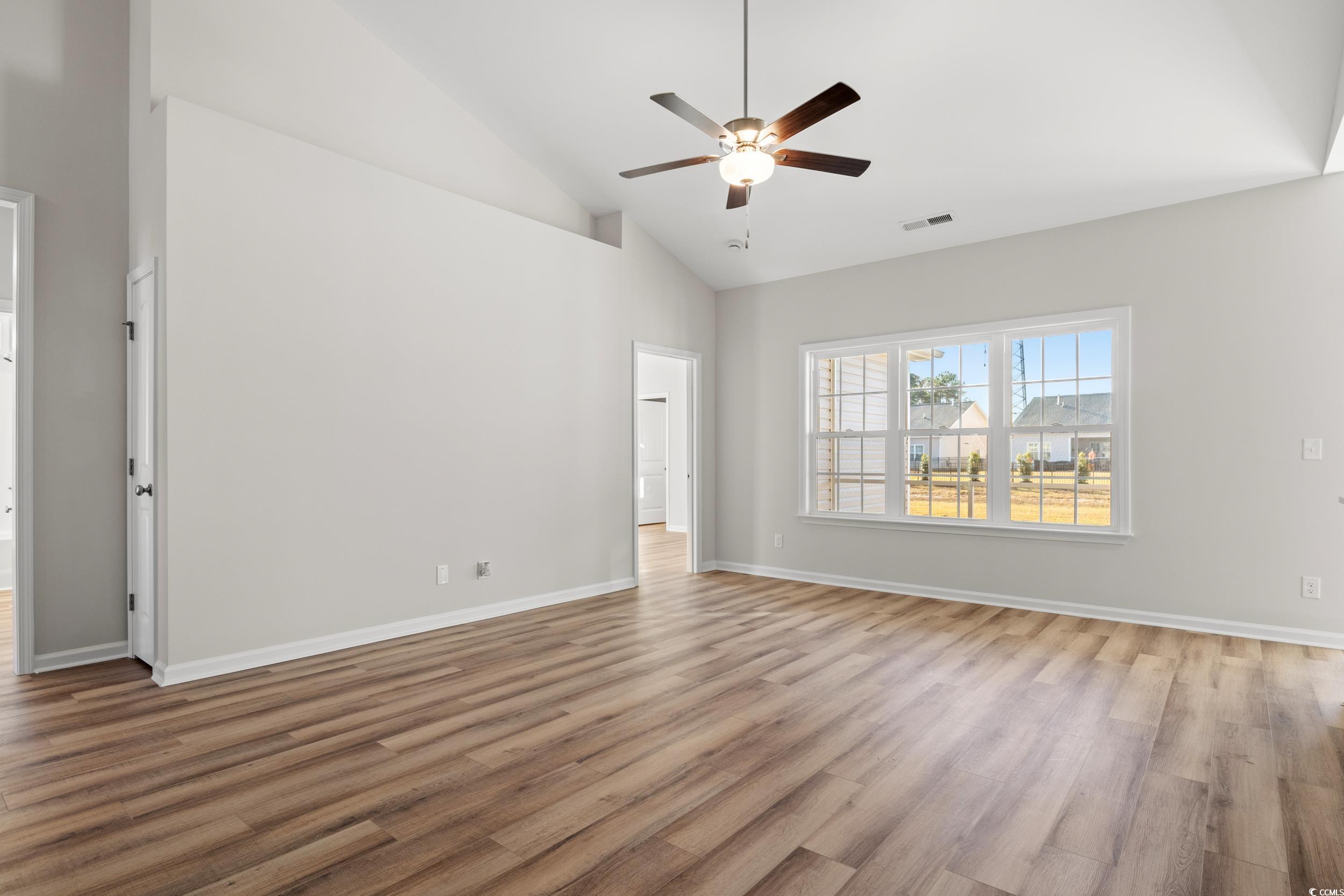 312 Lakota Loop Longs, SC 29568 - Photo 2 of 17 Unfurnished room with high vaulted ceiling, light