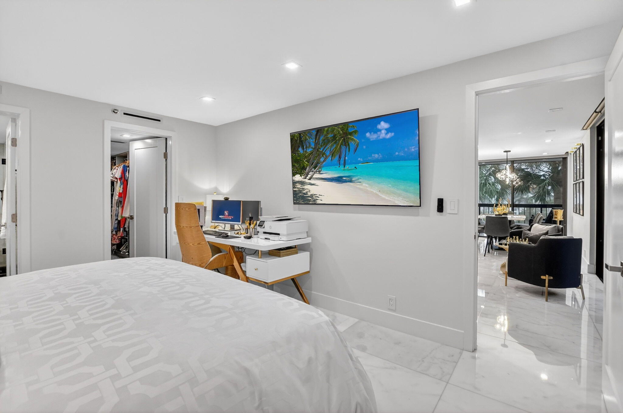 1834 Bridgewood Drive Boca Raton, FL 33434 - Photo 17 of 24 a bedroom with a bed and a flat screen tv