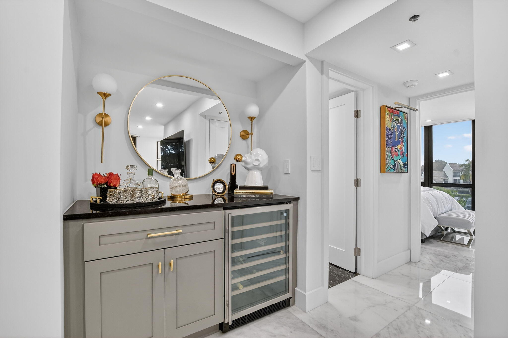 1834 Bridgewood Drive Boca Raton, FL 33434 - Photo 7 of 24 a bathroom with a sink and a mirror