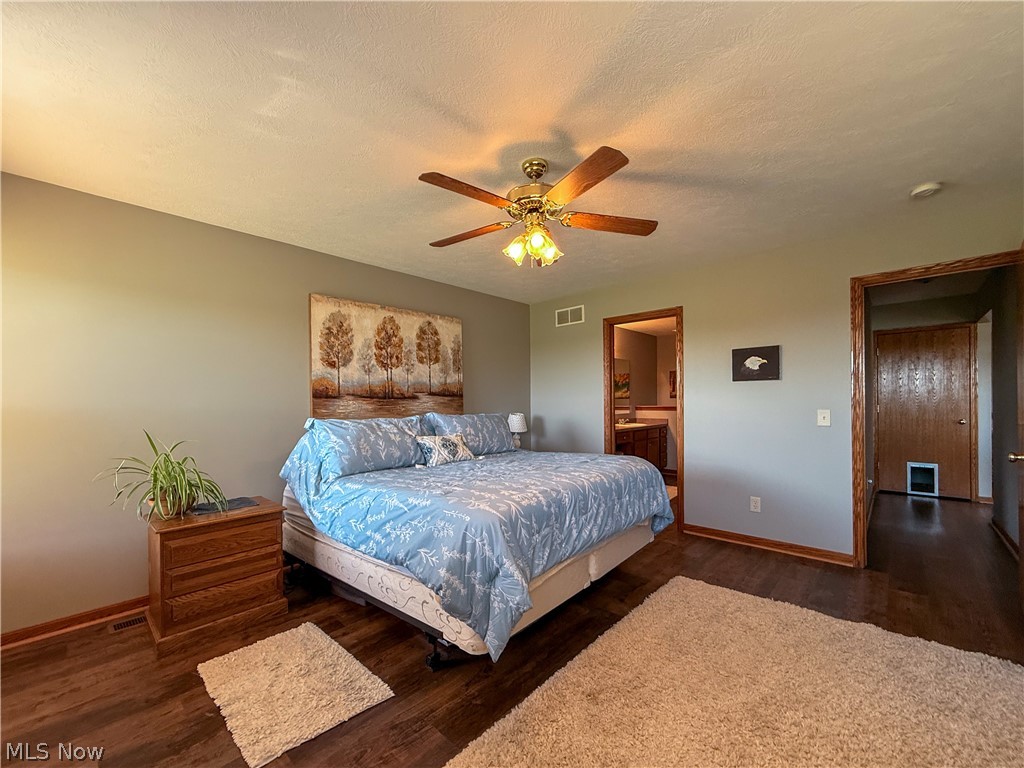 125 Pondview Circle Rittman, OH 44270 - Photo 17 of 38 Primary bedroom view to bathroom