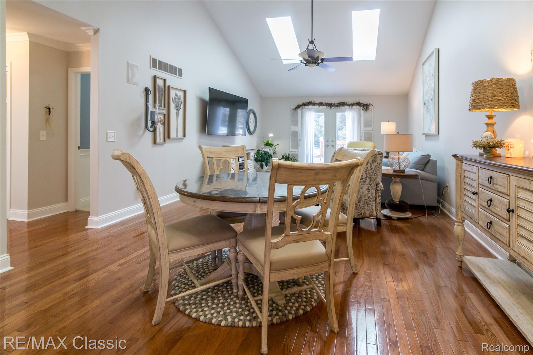 4655 Summer Ridge Drive, Unit 17 Howell, MI 48843 - Photo 4 of 34 Gorgeous open concept with hardwood throughout the living space, cathedral ceilings and skylights.