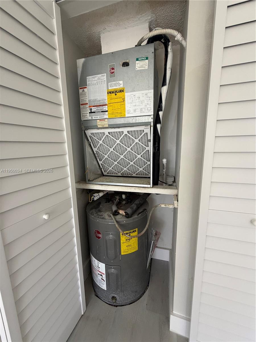 17021 North Bay Road, Unit 216 Sunny Isles Beach, FL 33160 - Photo 13 of 40 a view of water heater door