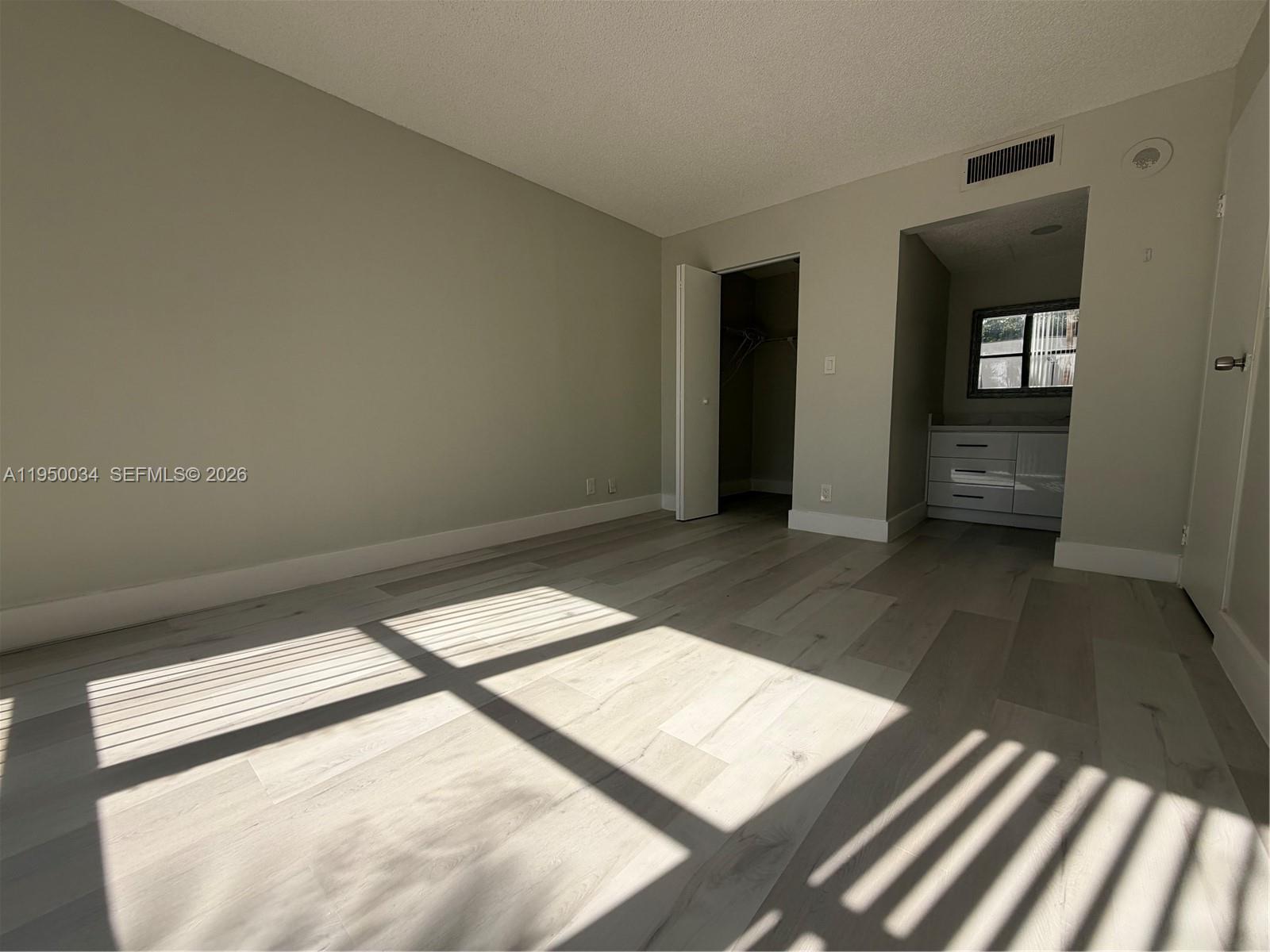 17021 North Bay Road, Unit 216 Sunny Isles Beach, FL 33160 - Photo 24 of 40 a view of an empty room and window